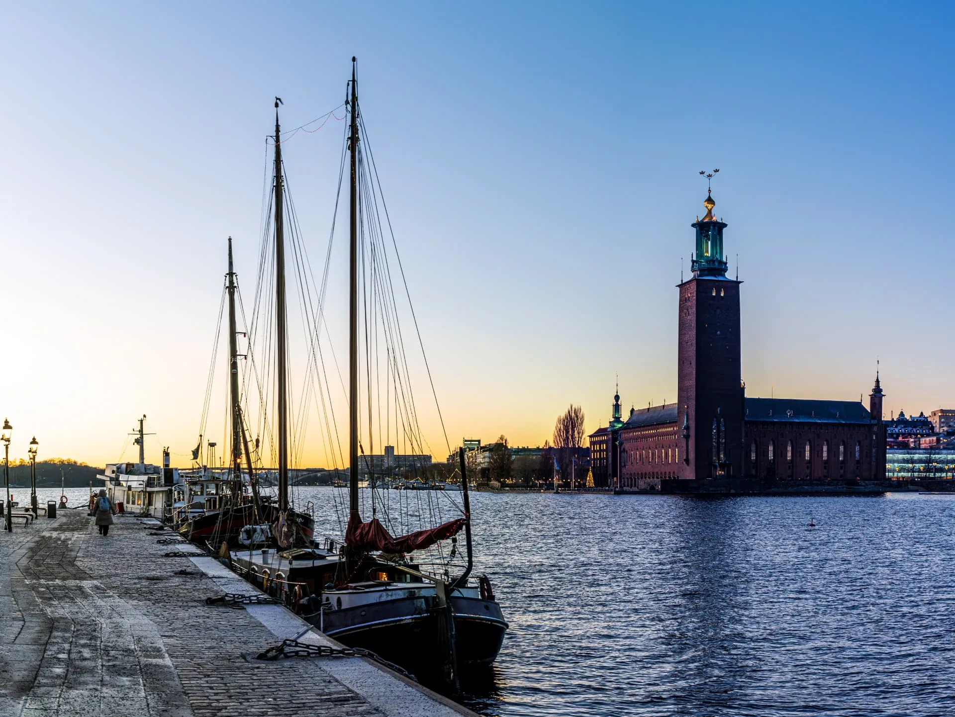 Stockholm waterfront at dusk with City Hall